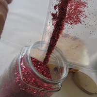 returning excess glitter to bottle